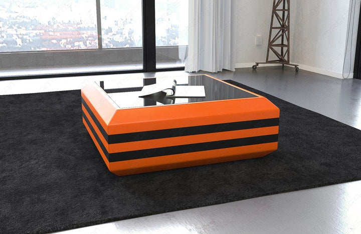 Leder Wohnzimmertisch Ravenna ausziehbar in orange-schwarz. Optional mit LED Beleuchtung erhÃ¤ltlich.