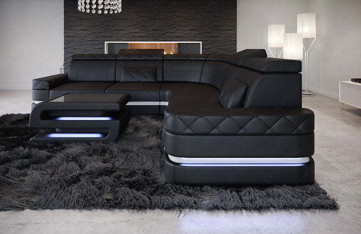 Das Mini Ledersofa Positano in der L Form in schwarz - weiss Seitenansicht