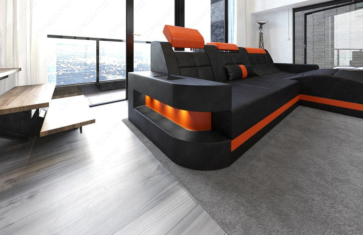 Detailansicht der kleinen Armlehne beim Ecksofa Wave L Form in schwarz - orange