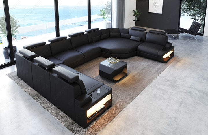 Wohnlandschaft Asti U Form komplett in schwarzem Leder. Couchtisch und USB AnschlÃ¼sse sind optional erhÃ¤ltlich.