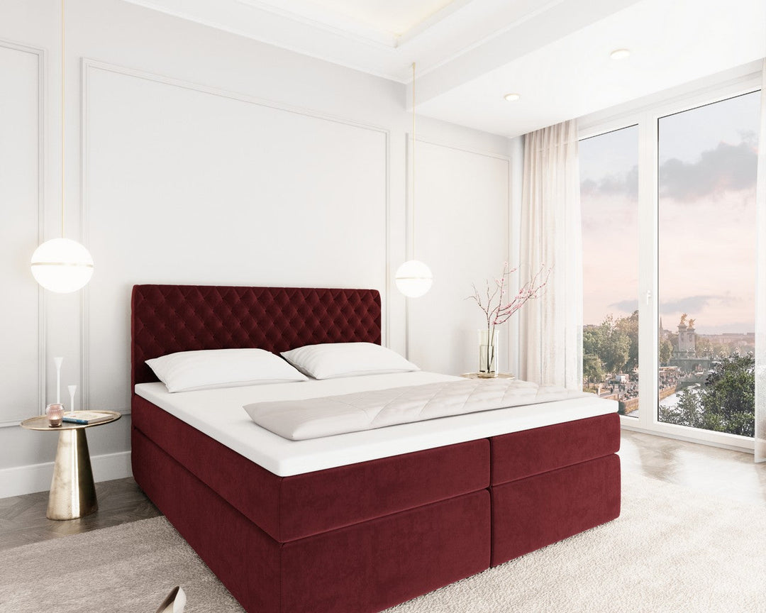 Boxspringbett Mejorada mit Bettkasten als Stauraum in Samt Rot