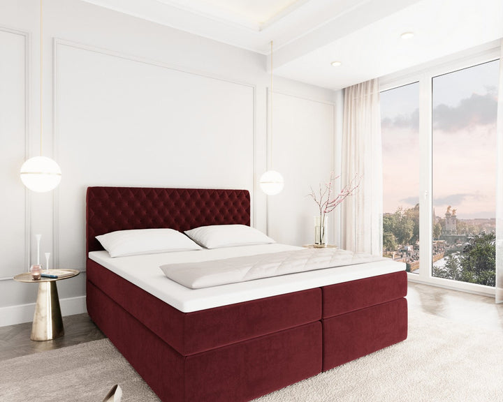 Boxspringbett Mejorada mit Bettkasten als Stauraum in Samt Rot