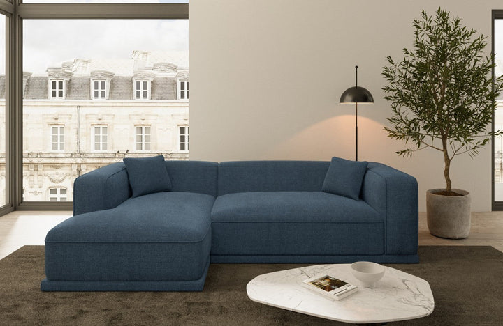 Moderns Stoffsofa Merida L Form kurz mit Strukturstoff Bezug - Blau
